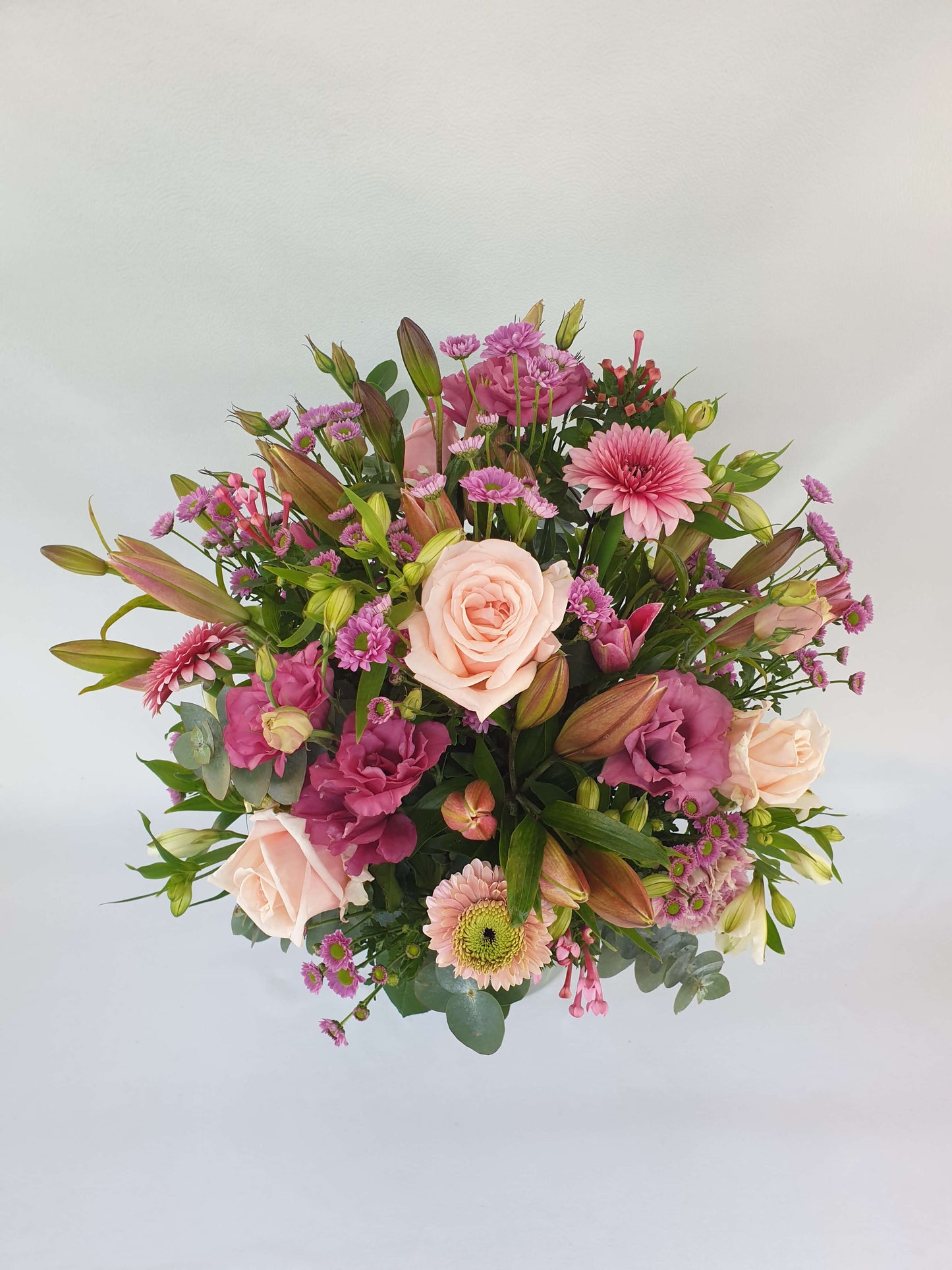 A pink bouquet from above.