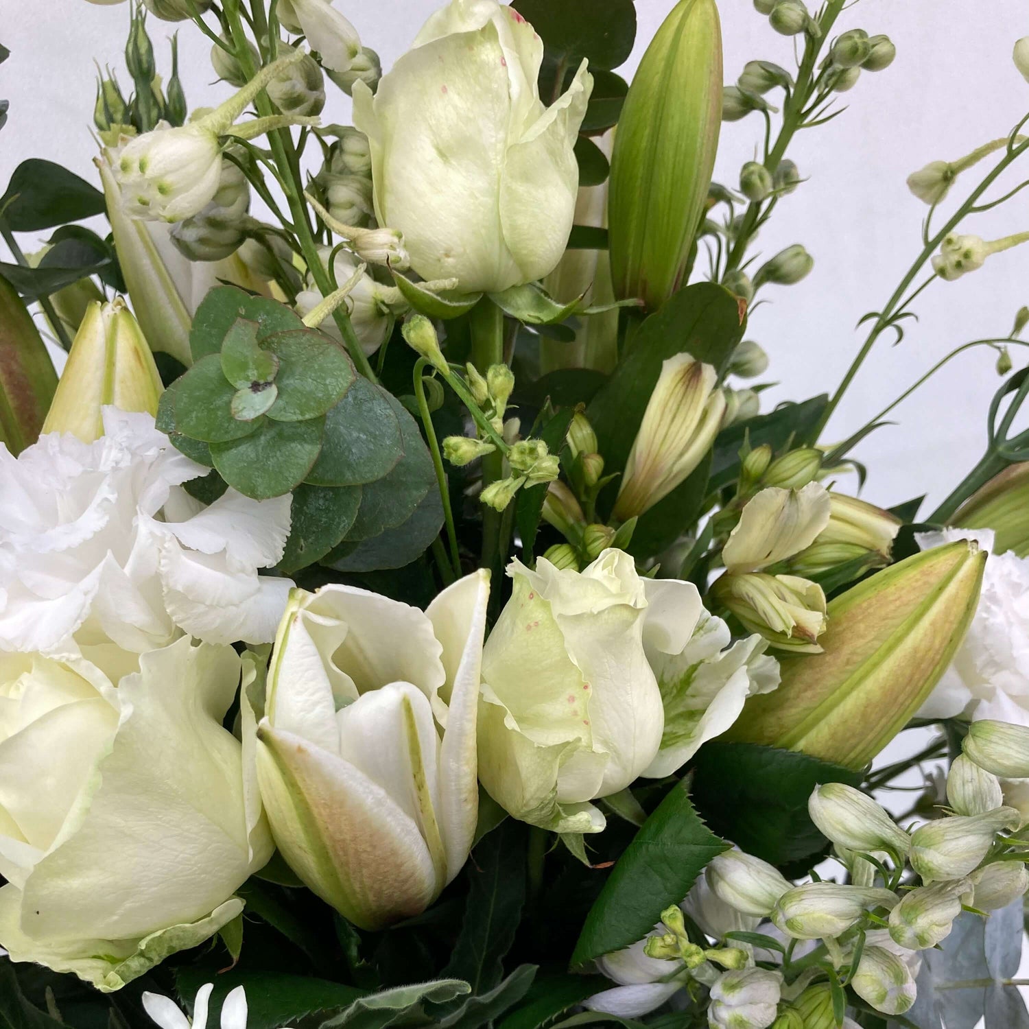 Green and white flowers make the perfect corporate gift.