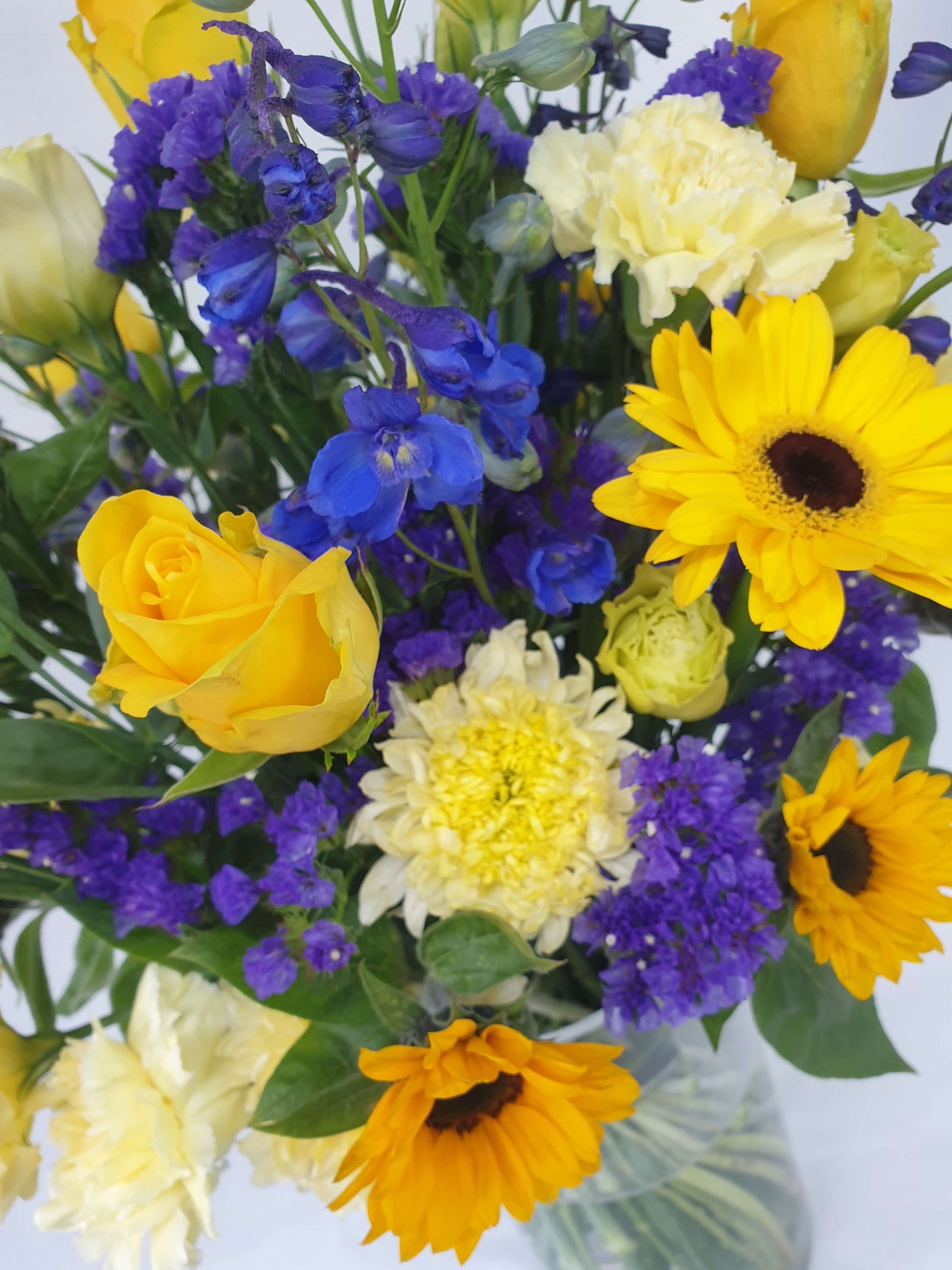 A blue and yellow bouquet up close