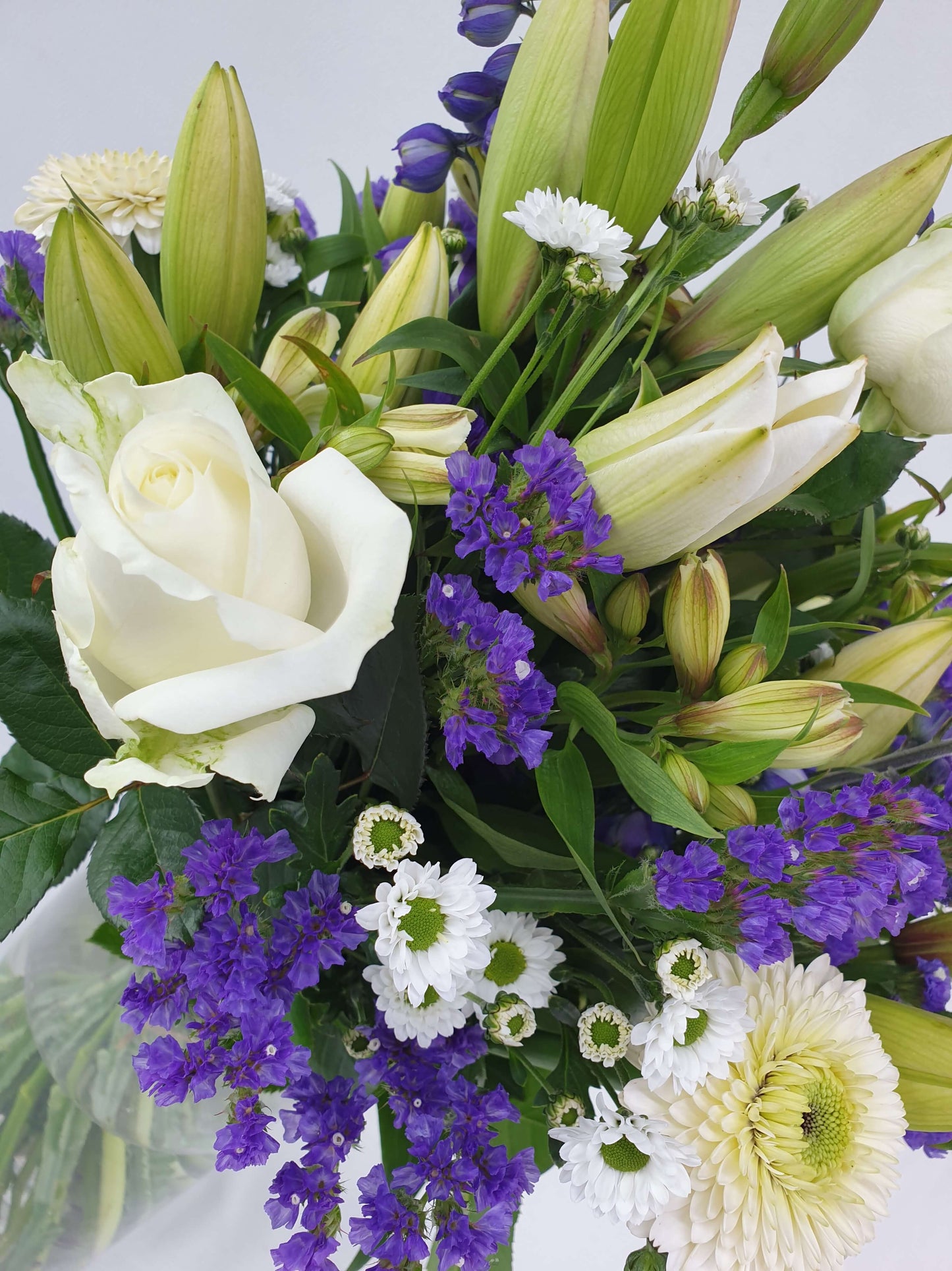 Close up of a purple and white bouquet 