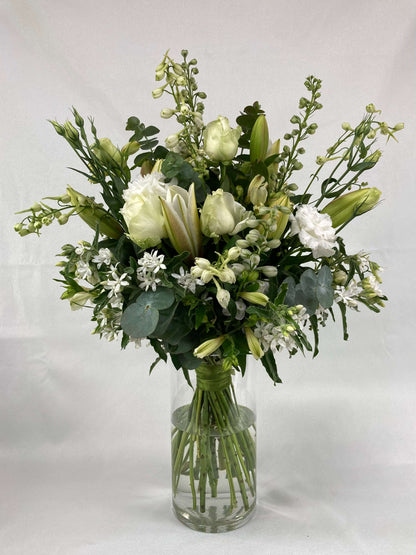A white and green bouquet that you can receive with our flower subscription offer.
