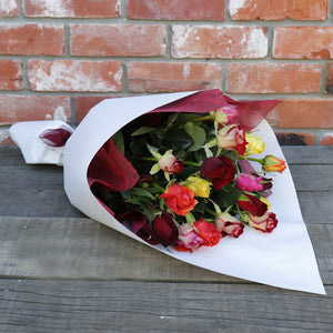 Bright multi-coloured Roses with Alstromeria